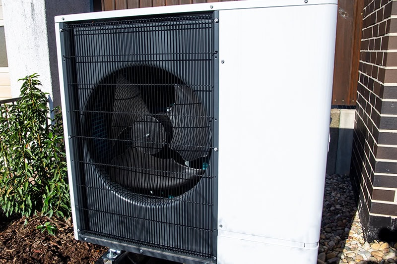 Air and water heat pump on a residential home